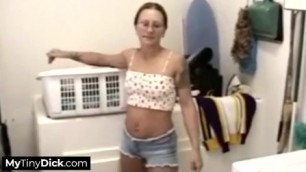 Horny brunette sucking on his tiny dick