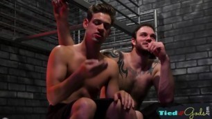 Submissive Policeman Whipped By Tattooed Dom
